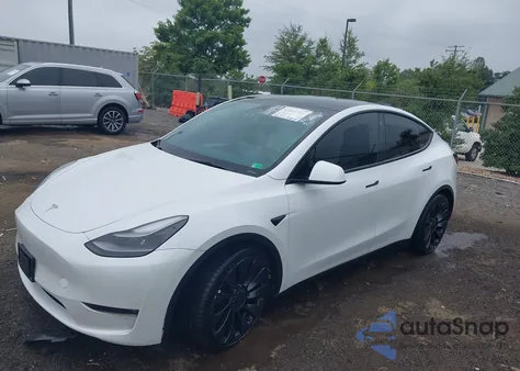 2023 Tesla Model Y Performance Dual Motor All-Wheel Drive z USA, uszkodzony, nr VIN 7SAYGDEF3PF603431